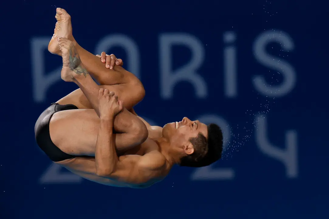 El dominicano Jonathan Ruvalcaba en la final de trampol&iacute;n de tres metros. EFE/ Julio M&uacute;&ntilde;oz